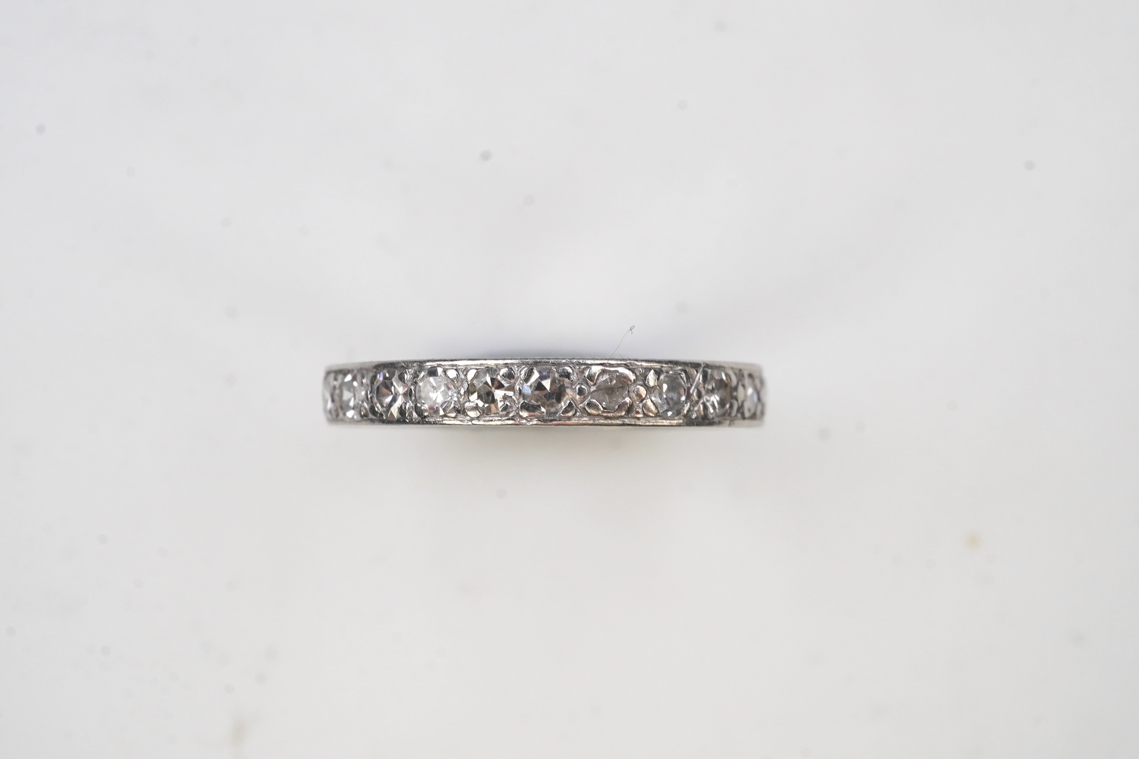 A diamond eternity ring, mid 20th century